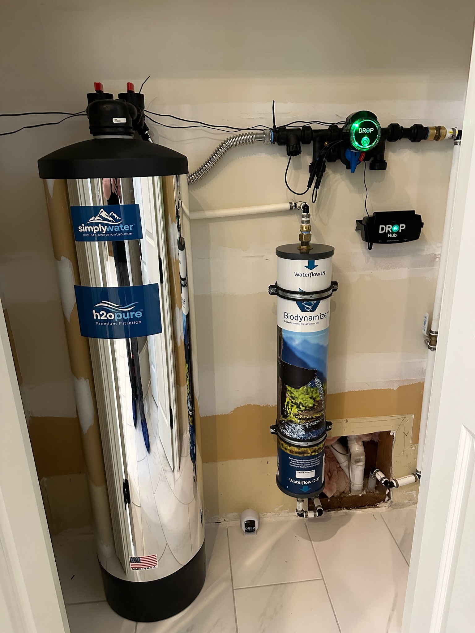 Completed two-tank Simply Water installation with control heads and bypass valves